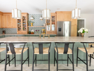 TEW DESIGN STUDIO | HEATHER RIDGE KITCHEN Kitchen bar view showcasing recessed and bold light fixtures, marble, brass fixtures and beautiful natural wood cabinetry.