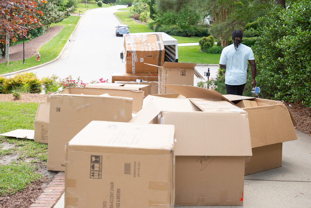 Delivery boxes in a driveway - step 5: procurement & vendor coordination - TEW Design Studio