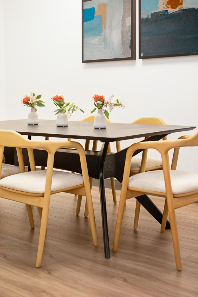 Table in workplace break room designed for employee wellness - TEW Design Studio